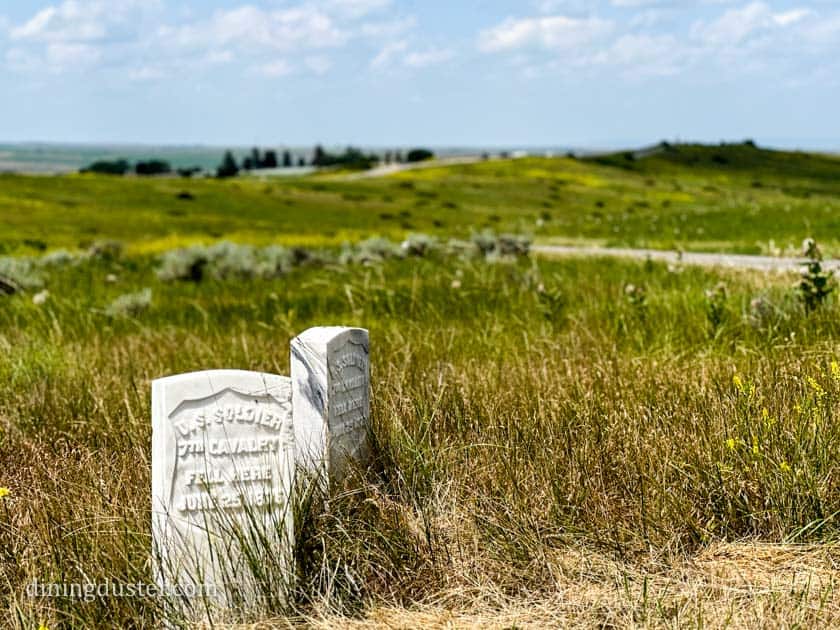 White marble markers at Last Stand Hill memorializing fallen U.S. soldiers