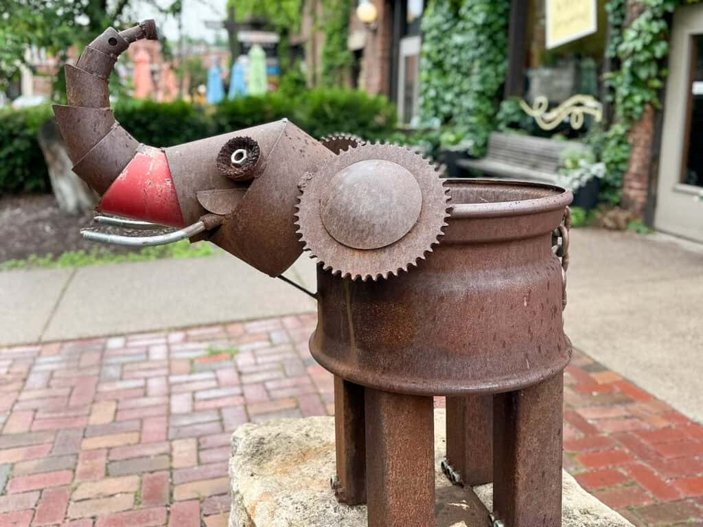 Public sculpture displayed outside of shops in downtown Stillwater