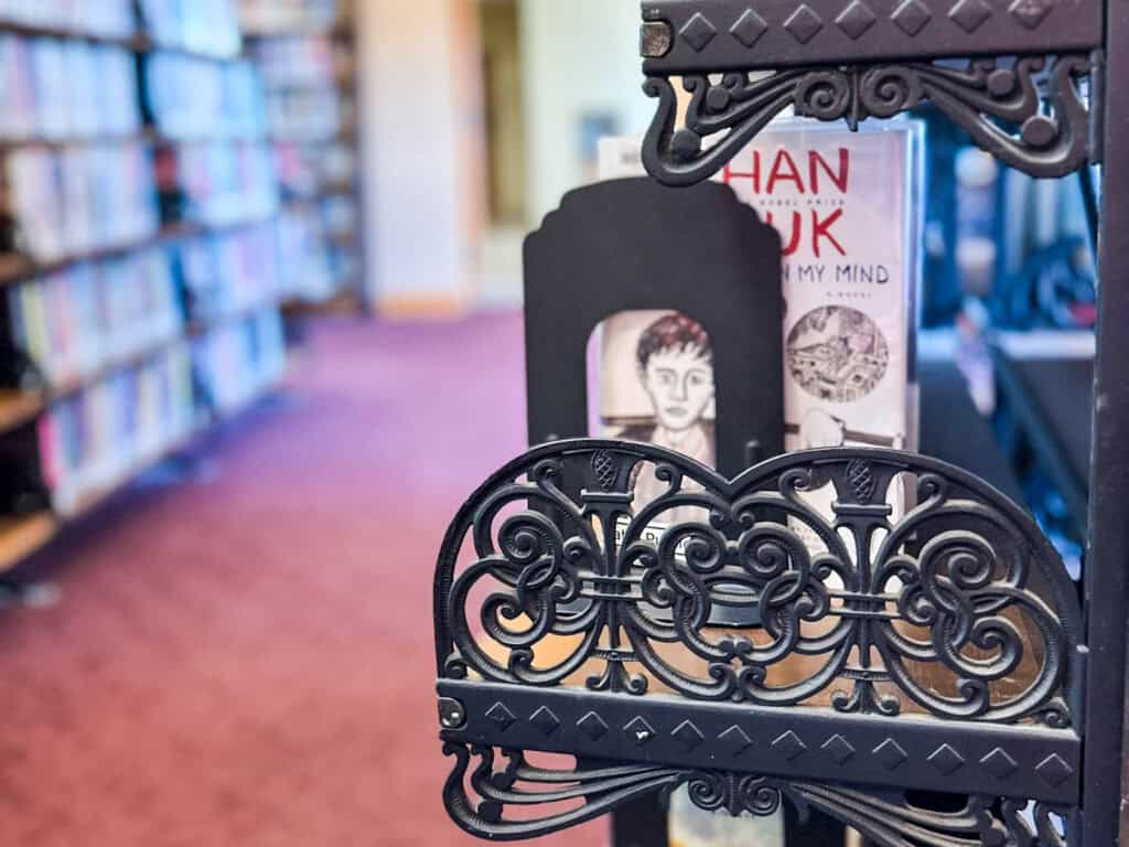 historic wrought iron shelves in Stillwater Public Library