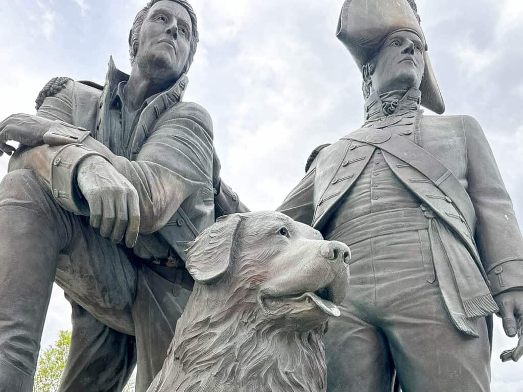 Lewis and Clark statue with seamus outside the Lewis & Clark exhibit Sioux City