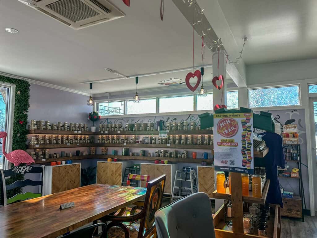 Tea wall with a large selection of loose leaf teas at Casting Whimsy tea room in Woodstock Illinois