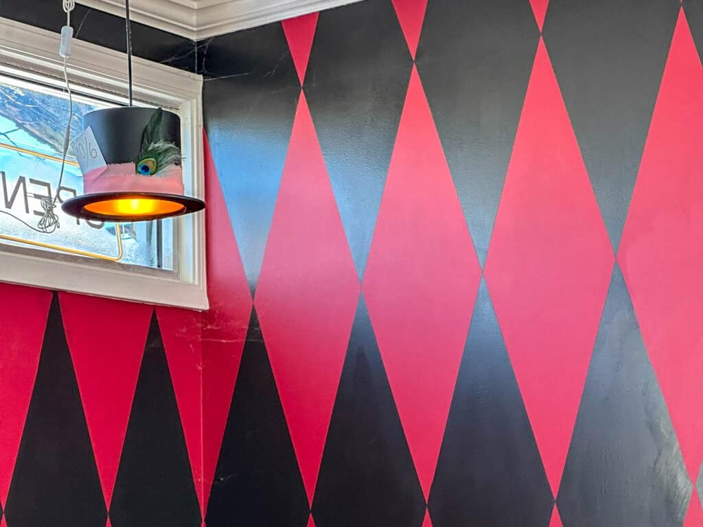 Alice in Wonderland wall and mad hatter light fixure at casting whimsy in woodstock illinois