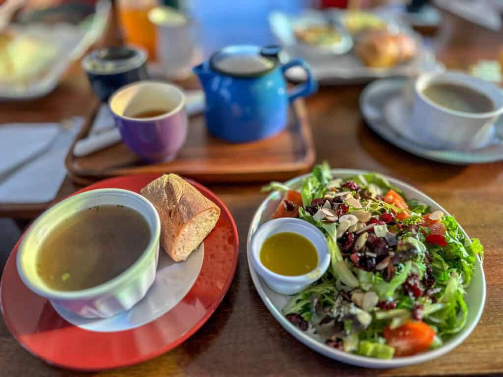 Spread of tea, barley soup and a salad for afternoon tea at Casting Whimsy